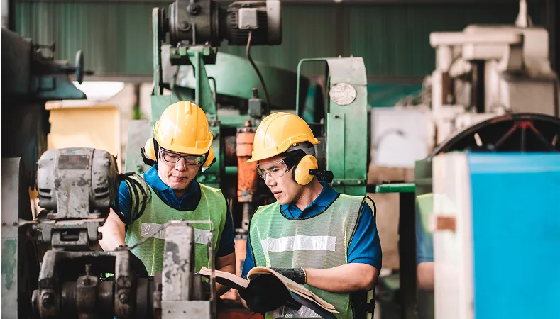 IAM An Industrial Dishwasher Manufacturing Worker
